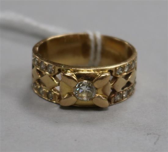 An 18k gold and diamond dress ring, size N.